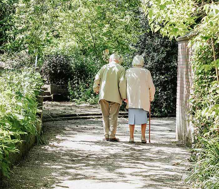 Picture of older couple walking on a path - LPA's